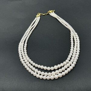 Triple strand necklace.